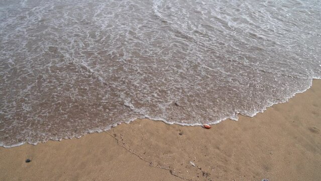 movimiento de las olas al contacto con la playa