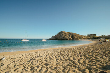 Santa Maria beach in Baja California Sur, two boats in the background. Copy Space.