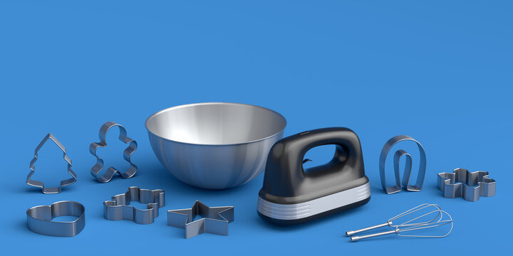 Metal bowl with electric mixer and cookie cutters on blue background
