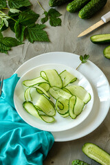 sliced cucumber on a wooden board