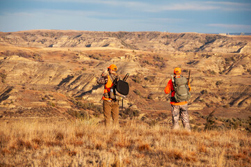 Hunter scouting in the midwest North Dakota Badlands looking for deer