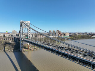 Aerial view of George Washington Bridge in Fort Lee, NJ. George Washington Bridge is a suspension bridge spanning the Hudson River connecting NJ to Manhattan.