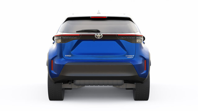 Tokyo, Japan. April 20, 2022: Toyota Yaris Cross 2020. Compact dark blue SUV with a hybrid engine and four-wheel drive for the city and suburban areas on a white isolated background. 3d illustration
