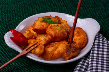Cassava dumplings on a white platter