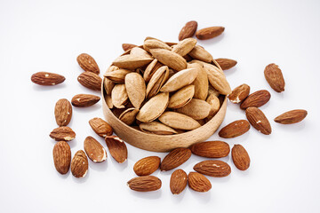fresh almonds in shell on a white background