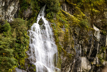 Fototapeta na wymiar A view of the mountain and his waterfall 
