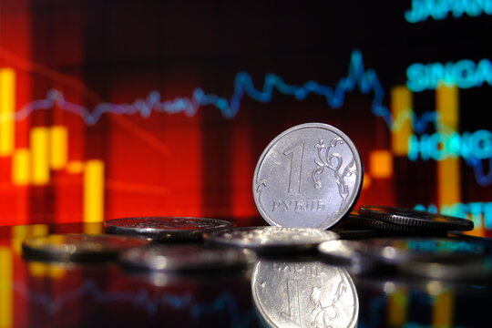 Background, blur, out of focus, bokeh, pasteurization. Coins of the Russian ruble. The rise of the ruble exchange rate. Payment for gas in Russian currency.