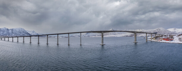 Andøy Bridge crossing the dredged Risøysundet strait between the islands of Andøya and Hinnøya,...