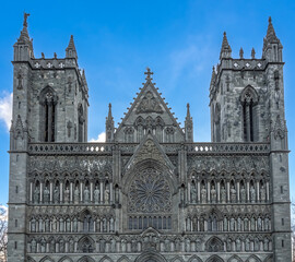 Naklejka premium The facade of Nidaros Cathedral (Nidarosdomen), Trondheim, Trøndelag, Norway. Built over the burial site of King Olav (St. Olav, the patron saint of the nation), where Norwegian kings are crowned.