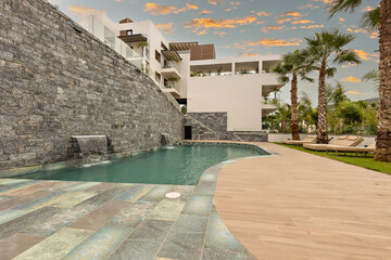 Outdoor hotel swimming pool in a sea resort