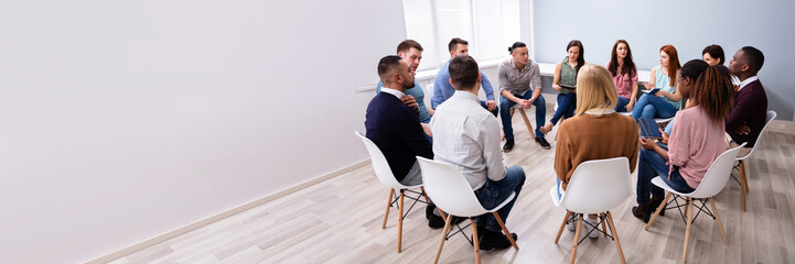 Multi-ethnic People Sitting In Circle Counseling