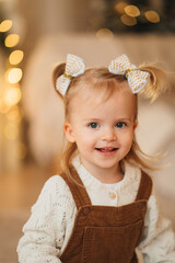 cute little girl in a corduroy jumpsuit. 