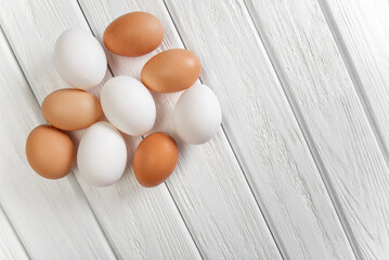 eggs on white wooden background