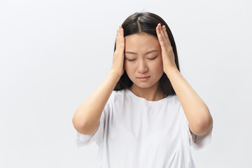 Fototapeta premium SARS CoVID symptoms. Tormented tanned beautiful young Asian lady touch forehead feel elevated temperatures posing isolated on white background. Injuries Poor health Illness concept. Cool offer Banner