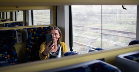 beautiful woman traveling on a train