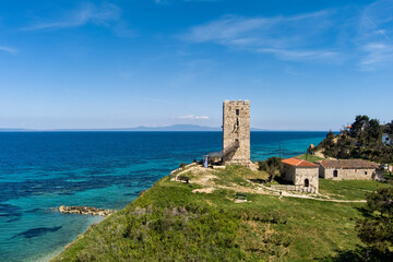 Fototapeta na wymiar Aerial view of byzantine tower and beach of village Nea Fokea in Chalkidiki Greece