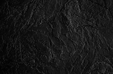 Black stone background. Black grunge background.Graphite texture. Copy space