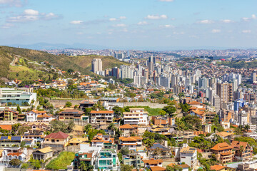 Fototapeta na wymiar City of Belo Horizonte seen from the top of the Mangabeiras viewpoint during a beautiful sunny day. Capital of Minas Gerais, Brazil.