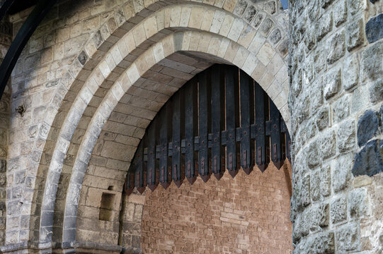 wooden portcullis with metal spikes on a medieval town gate in cologne