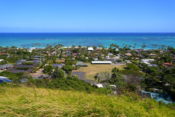 Fototapeta na wymiar Ocean front neighborhood of Lanikai Beach in Kailua, as seen from the Lanikai Pillbox hike, on the eastern side of Oahu in Hawaii, United States