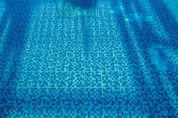 blue mosaic pool tile background with shadows 