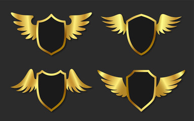 Obraz premium Shield wing metal banner emblem gold flat set. Elegant military emblem protection security badge. Award high quality royal dynasty coat arms. Retro safe shape template heraldry medieval isolated