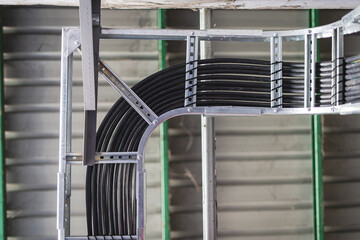 Install the electrical wiring system on the cable tray