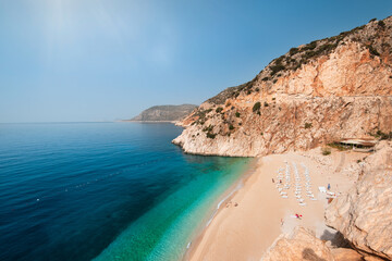 Kaputas beach in the middle of the day. Calm view of Kaputaş beach on a hot day. The most famous...