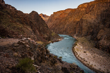 Fototapeta na wymiar Colorado River Snakes Through The Grand Canyon In Morning Light