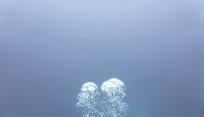 Underwater art for your luxury interior design at home or at your office. Air bubbles with a blue background. From a scuba dive in the sea.