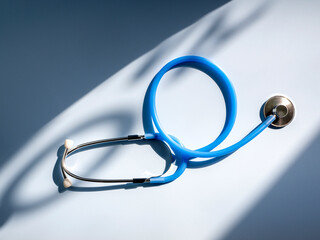 Medical check up concept. stethoscope on white background with shadow.