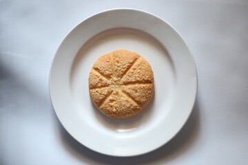 cottage cheese cookies in a plate on a white background