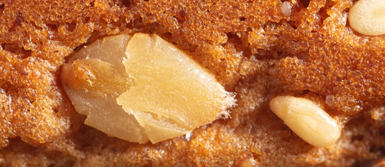 Sesame seeds on a ruddy cupcake.