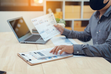 Businesswoman using computer and graph showing successful teamwork. Summary of past income and expenses, business idea	