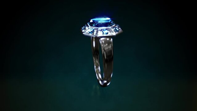 Shining white gold or silver ring with blue topaz gems rotate, fictive - loop video