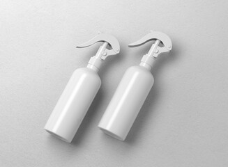 Plain white plastic glossy water mist spray bottle gun on isolated background 