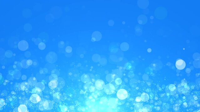 Abstract glowing sphere particles moving up at shining blue light background. Seamless loopable background.