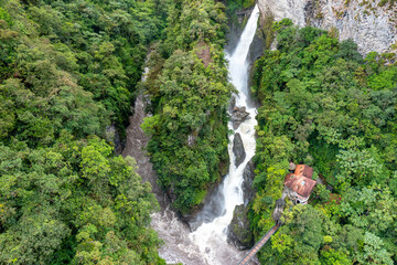 El Pailon del Diablo waterfall cascade and suspended bridge. Aerial view. Banos Santa Agua, Ecuador. South America.