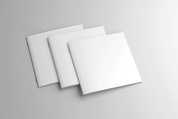 Empty blank plain white square shape brochures on isolated background