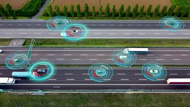 Aerial view of Self Driving Autonomous Cars with HUD-Elements on Highway. Futuristic Intelligent Traffic Detection System. Concept of Smart Transportation.