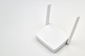 White wireless router on light background. Close-up