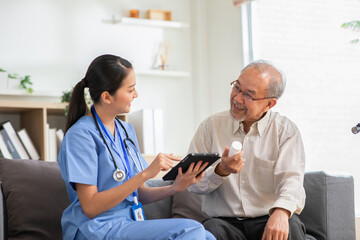 Obraz premium A doctor who works in an office and consults to patient, she explains health care symptoms and help elderly man, giv medicines. Writing down diagnosed and symptoms, elderly care, health care concept.