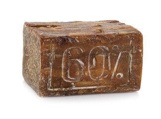A piece of old laundry soap. Isolated on white background.