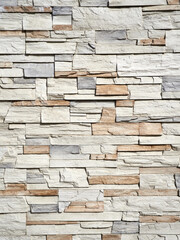 Facade decoration with decorative natural stone. Texture of decorative stone