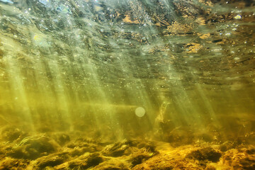 sun rays under water landscape, seascape fresh water river diving