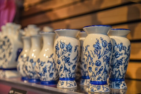 Lisse, Netherlands, April 2022. Traditional souvenirs from Holland, clogs and Delfts Blauw.