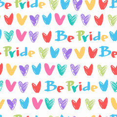 Seamless pattern with words Be Pride and rainbow-colored hearts. LGBTQ concept for gift wrap, textile, home decor