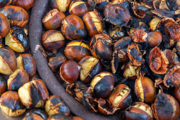 plump chestnuts cooked on charcoal