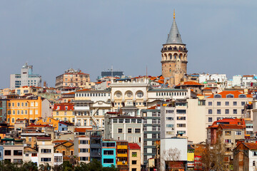 Fototapeta premium galata tower rising from the buildings