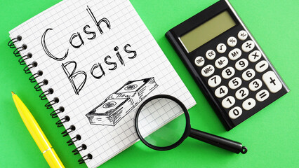 Cash Basis is shown using the text and photo of calculator